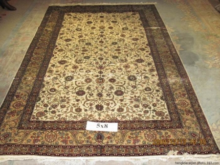 Tabriz hand knotted silk carpets